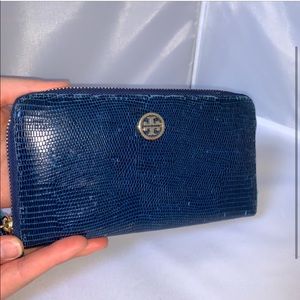 Tory Burch robinson snake embossed blue continental zip wallet.
